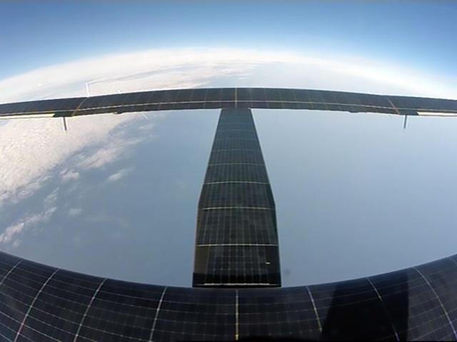 This June 21, 2016 photo Solar Impulse shows a multiple-day flight on its way over the Atlantic Ocean. The plane is powered by around 17,000 solar cells embedded in its wings. (AFP) 