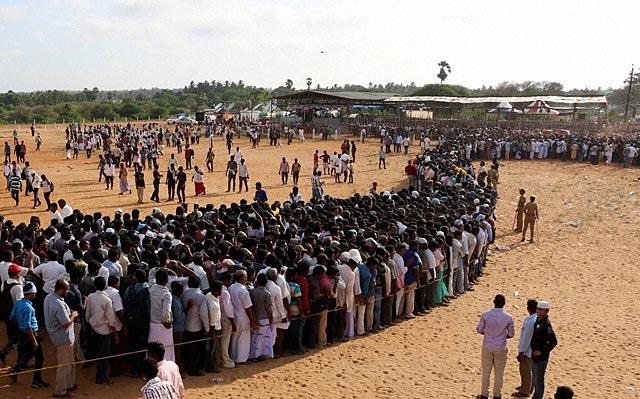 People wait in a queue to pay their respects to Kalam at public view ground in Rameswaram on July 29, 2015. (PTI Photo)