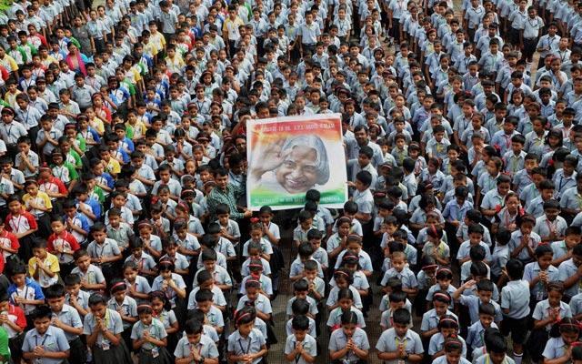 School children pray during the condolence meet for Kalam in Agartala on July 29, 2015. (PTI Photo)