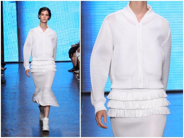DKNY played with volume in the Spring/Summer 2015 collection, pairing flared skirts with sporty bomber jackets. (AFP) 