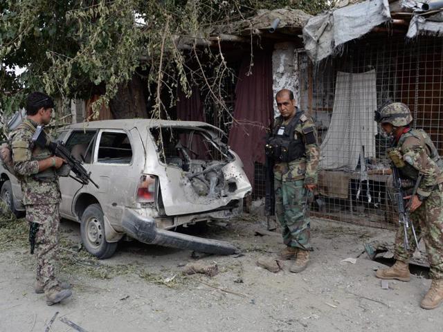 An Afghan soldier inspects a destroyed vehicle after an operation to capture Islamic State fighters in Kot district of eastern Nangarhar province on Tuesday. (AFP) An Afghan soldier inspects a destroyed vehicle after an operation to capture Islamic State fighters in Kot district of eastern Nangarhar province on Tuesday. (AFP)