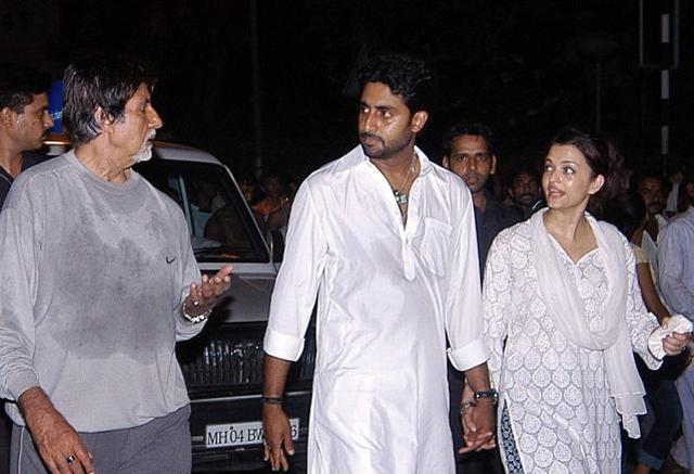 This file photograph taken on May 27, 2008, shows Indian Bollywood actor Amitabh Bachchan (L) as he speaks with his son Abhishek Bachchan (C) and daughter-in-law Aishwarya Rai-Bachchan (2R) as they walk barefoot on their way to pray at The Siddhivinayak Temple in Mumbai. (AFP) This file photograph taken on May 27, 2008, shows Indian Bollywood actor Amitabh Bachchan (L) as he speaks with his son Abhishek Bachchan (C) and daughter-in-law Aishwarya Rai-Bachchan (2R) as they walk barefoot on their way to pray at The Siddhivinayak Temple in Mumbai. (AFP)