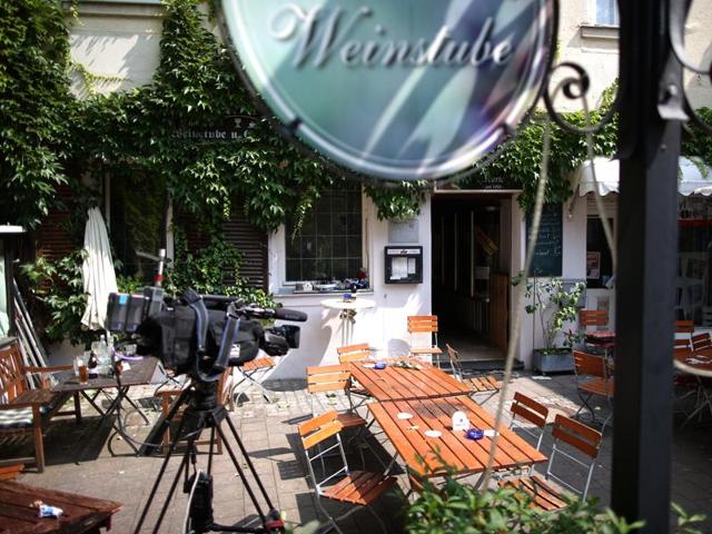 A TV camera stands near the site of a bomb attack, in the courtyard of 'Eugen's Weinstube' vine tavern in Ansbach, Germany. (AP Photo) A TV camera stands near the site of a bomb attack, in the courtyard of 'Eugen's Weinstube' vine tavern in Ansbach, Germany. (AP Photo)