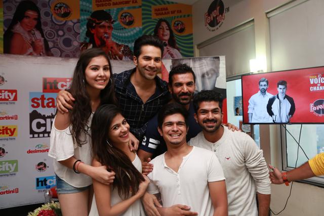 John and Varun pose with their fans. (PHOTO: AMAL KS/HINDUSTAN TIMES) 