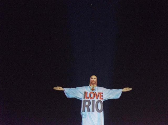 A projection is made over the statue of Christ the Redeemer as part of the launching of the new informative website "iloverio.com" that tells about Rio de Janeiro's various attractions in English ahead of the Rio 2016 Olympic Games, in Rio de Janeiro, Brazil, on July 26, 2016. (AFP) A projection is made over the statue of Christ the Redeemer as part of the launching of the new informative website "iloverio.com" that tells about Rio de Janeiro's various attractions in English ahead of the Rio 2016 Olympic Games, in Rio de Janeiro, Brazil, on July 26, 2016. (AFP)