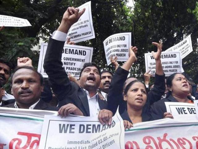 Telangana advocates protest in front of the high court., demanding separate a high court for Telangana, in Hyderabad in June. (PTI file) Telangana advocates protest in front of the high court., demanding separate a high court for Telangana, in Hyderabad in June. (PTI file)