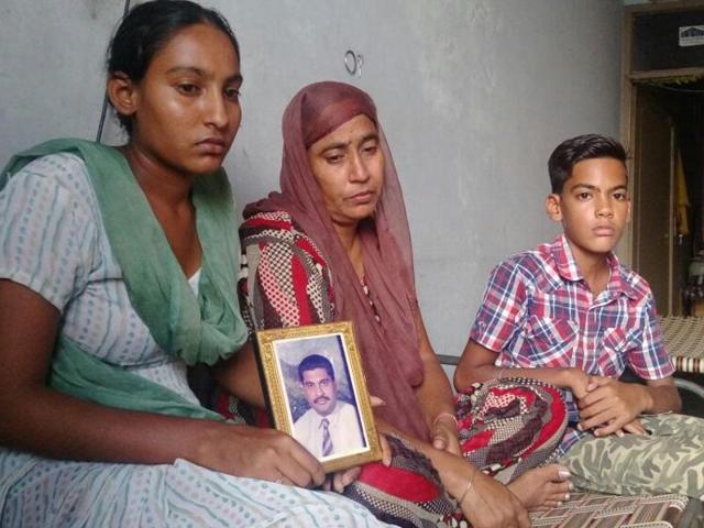 From left: Gurdip Singh’s daughter Manjot Kaur, wife Kulwinder Kaur and son Sukhbir Singh at their house in Khehra Mohalla of Nakodar in Jalandhar district. (Sikander Singh Chopra/HT Photo) From left: Gurdip Singh’s daughter Manjot Kaur, wife Kulwinder Kaur and son Sukhbir Singh at their house in Khehra Mohalla of Nakodar in Jalandhar district. (Sikander Singh Chopra/HT Photo)