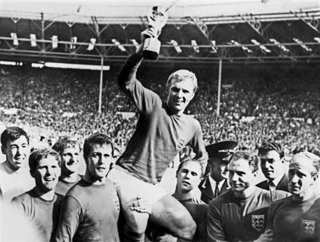 This file photo taken on July 30, 1966 shows England's national soccer team captain Bobby Moore holding aloft the Jules Rimet trophy as he is carried by his teammates following England's victory. (AFP) This file photo taken on July 30, 1966 shows England's national soccer team captain Bobby Moore holding aloft the Jules Rimet trophy as he is carried by his teammates following England's victory. (AFP)