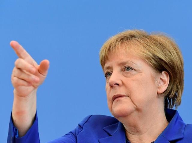 Chancellor Angela Merkel has firmly rejected calls to reverse her welcoming stance towards refugees despite a series of brutal attacks in the country. (AP)