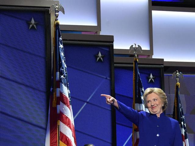 US Presidential nominee, Hillary Clinton, gestures to US President Barack Obama speaks during the third night of the Democratic National Convention at the Wells Fargo Center in Philadelphia, Pennsylvania, July 27, 2016. (AFP Photo) US Presidential nominee, Hillary Clinton, gestures to US President Barack Obama speaks during the third night of the Democratic National Convention at the Wells Fargo Center in Philadelphia, Pennsylvania, July 27, 2016. (AFP Photo)