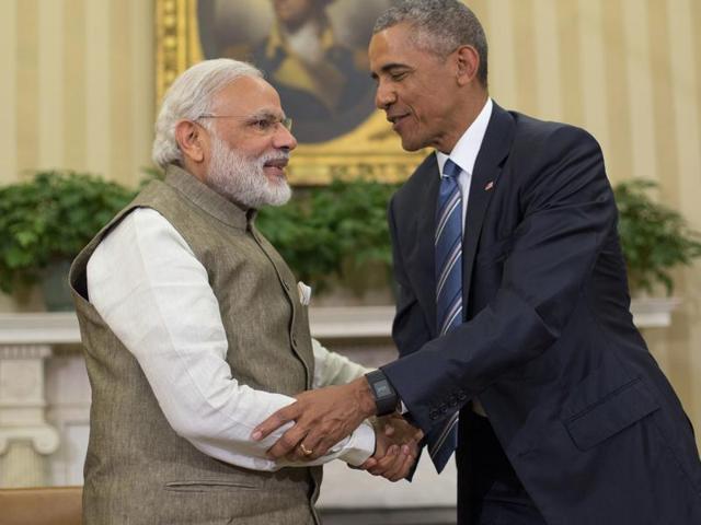 US President Barack Obama with Prime Minister Narendra Modi at the Oval Office of White House in Washington. (AP File Photo) US President Barack Obama with Prime Minister Narendra Modi at the Oval Office of White House in Washington. (AP File Photo)