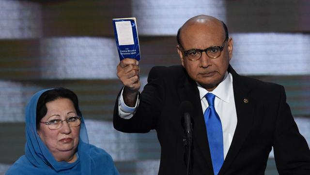 Khizr Khan holds his personal copy of the US Constitution (AFP) Khizr Khan holds his personal copy of the US Constitution (AFP)