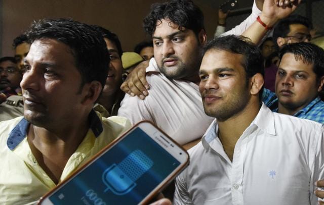 Indian Wrestler Narsingh Yadav leaves after appearing before National Anti Doping Agency (NADA) in New Delhi, India, on Thursday.(Mohd Zakir/HT PHOTO)