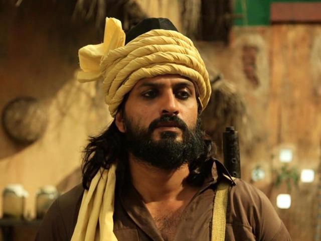 Actor Nigel Akkara in a still from Bengali film, Rajkahani. Actor Nigel Akkara in a still from Bengali film, Rajkahani.