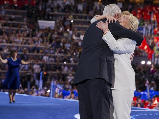 Democratic presidential nominee Hillary Clinton celebrates on stage with husband former US president Bill Clinton, running mate Tim Kaine and son-in-law Marc Mezvinsky on the fourth and final night of the Democratic National Convention at Wells Fargo Center on Thursday. (AFP) Democratic presidential nominee Hillary Clinton celebrates on stage with husband former US president Bill Clinton, running mate Tim Kaine and son-in-law Marc Mezvinsky on the fourth and final night of the Democratic National Convention at Wells Fargo Center on Thursday. (AFP)
