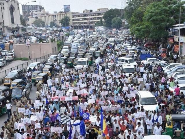 The Dalit community takes out a protest rally in Surat in protest against the thrashing of youths in Una by cow protection vigilantes.(PTI File Photo)