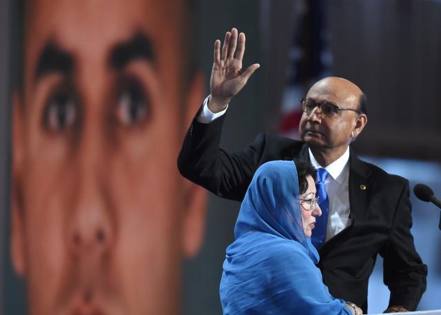 Khizr Khan, father of Capt Humayun Khan who was killed while serving in Iraq with the US Army, waves as his wife looks on during the final day of the Democratic National Convention in Philadelphia. (AFP) Khizr Khan, father of Capt Humayun Khan who was killed while serving in Iraq with the US Army, waves as his wife looks on during the final day of the Democratic National Convention in Philadelphia. (AFP)