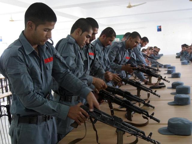In this Sunday, July 24, 2016 photo, Afghan police soldiers practice, in Lashkargah, capital of southern Helmand province, Afghanistan. (AP) In this Sunday, July 24, 2016 photo, Afghan police soldiers practice, in Lashkargah, capital of southern Helmand province, Afghanistan. (AP)