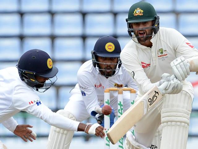 Sri Lanka's captain Angelo Mathews (C) and teammates leave the grounds with the stumps after victory.(AFP Photo) Sri Lanka's captain Angelo Mathews (C) and teammates leave the grounds with the stumps after victory.(AFP Photo)