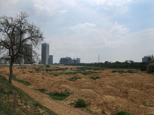 A tussle between the municipal corporation of Gurgaon (MCG) and forest department ensured that 250 rainwater harvesting pits could not be built in and around Ghata village this season, which may well have mitigated the havoc caused by rain over the last two days.(Parveen Kumar/HT Photo) A tussle between the municipal corporation of Gurgaon (MCG) and forest department ensured that 250 rainwater harvesting pits could not be built in and around Ghata village this season, which may well have mitigated the havoc caused by rain over the last two days.(Parveen Kumar/HT Photo)