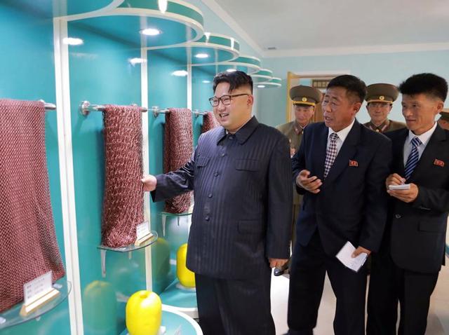 This undated photo released by North Korea's official Korean Central News Agency shows Kim Jong Un inspecting a newly-built combined fishing-tackle factory in Pyongyang.(AFP)
