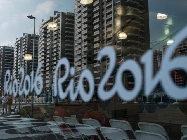 Athletes are reflected on a glass at the Olympic and Paralympic Village for the 2016 Olympic Games. (AFP Photo) Athletes are reflected on a glass at the Olympic and Paralympic Village for the 2016 Olympic Games. (AFP Photo)
