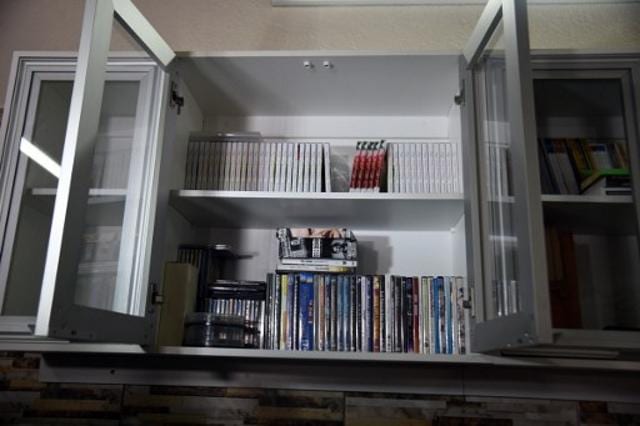 View of books, CDs and DVDs at Brazilian drug trafficker Jarvis Chimenes Pavao's cell at Tacumbu prison. (AFP) View of books, CDs and DVDs at Brazilian drug trafficker Jarvis Chimenes Pavao's cell at Tacumbu prison. (AFP)