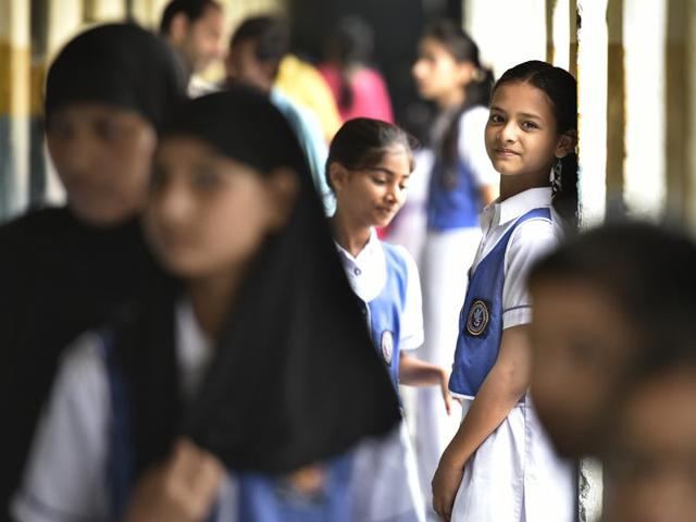 Some parents could also be seen talking to teachers about the lack of facilities at government schools in Delhi. (Raj K Raj/HT Photo) Some parents could also be seen talking to teachers about the lack of facilities at government schools in Delhi. (Raj K Raj/HT Photo)