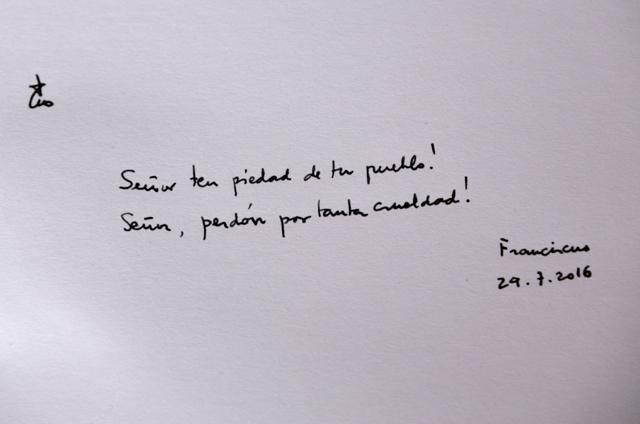 This image made available by the Auschwitz-Birkenau State Museum shows the inscription written in the guest book by Pope Francis when he visited the Nazi German death camp. (AP) This image made available by the Auschwitz-Birkenau State Museum shows the inscription written in the guest book by Pope Francis when he visited the Nazi German death camp. (AP)