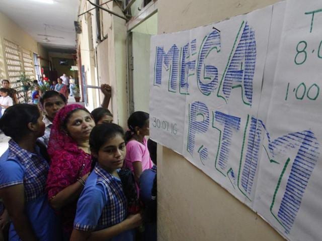 Students arrive with their parents for the parent-teacher meeting at the Sarvoday Kanya Vidyalaya, West Patel Nagar, in New Delhi on Saturday. (Sanchit Khanna/HT Photo) Students arrive with their parents for the parent-teacher meeting at the Sarvoday Kanya Vidyalaya, West Patel Nagar, in New Delhi on Saturday. (Sanchit Khanna/HT Photo)