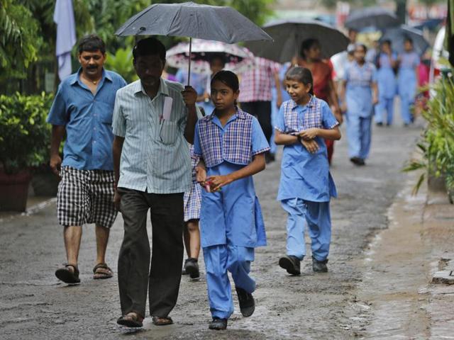 A man arrives at a government school in West Patel Nagar on Saturday to meet his daughter’s teachers. (SANCHIT KHANNA/HT PHOTO) A man arrives at a government school in West Patel Nagar on Saturday to meet his daughter’s teachers. (SANCHIT KHANNA/HT PHOTO)