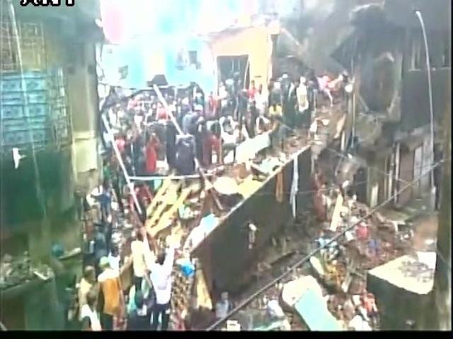 Six people died and several others were feared trapped under the debris of a three-storeyed building which collapsed in Gaibinagar, Bhiwandi. (ANI Photo) Six people died and several others were feared trapped under the debris of a three-storeyed building which collapsed in Gaibinagar, Bhiwandi. (ANI Photo)