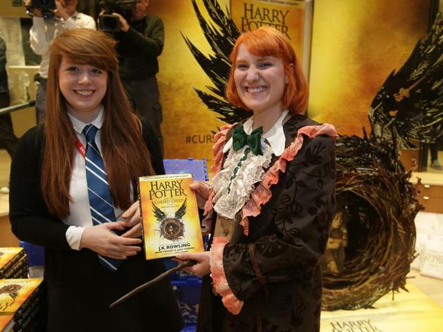 Harry Potter fan, Fran Plagge (right) with her copy of the book inside the Waterstones bookshop on Piccadilly in central London on Sunday. (AFP) Harry Potter fan, Fran Plagge (right) with her copy of the book inside the Waterstones bookshop on Piccadilly in central London on Sunday. (AFP)