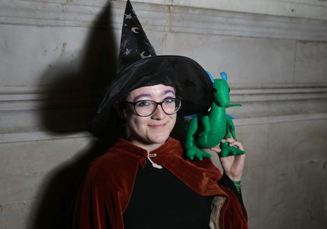 A Harry Potter fan poses for a photograph as she waits in the queue outside Waterstones bookshop in London on Sunday. (AFP) A Harry Potter fan poses for a photograph as she waits in the queue outside Waterstones bookshop in London on Sunday. (AFP)
