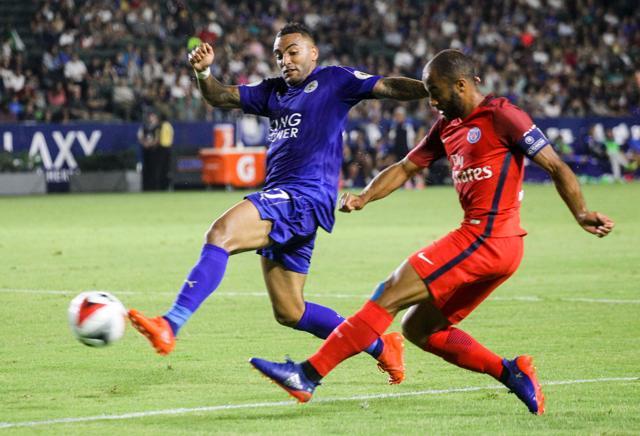 Leicester City defender Danny Simpson (L) and Paris Saint-Germain midfielder Lucas Moura (R) battle for the ball during their International Champions Cup match. (AFP Photo) Leicester City defender Danny Simpson (L) and Paris Saint-Germain midfielder Lucas Moura (R) battle for the ball during their International Champions Cup match. (AFP Photo)
