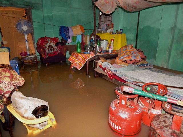 A submerged house due to flooding following rains in Dharmanagar, North Tripura (PTI file photo) A submerged house due to flooding following rains in Dharmanagar, North Tripura (PTI file photo)