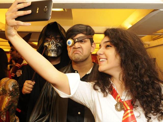 Harry Potter fans at Kolkata’s Oxford Bookstore taking selfies ahead of the launch of the eighth Harry Potter book, Harry Potter and Cursed Child with the Triwizard tournament. (SAmir Jana/ ht photo) Harry Potter fans at Kolkata’s Oxford Bookstore taking selfies ahead of the launch of the eighth Harry Potter book, Harry Potter and Cursed Child with the Triwizard tournament. (SAmir Jana/ ht photo)