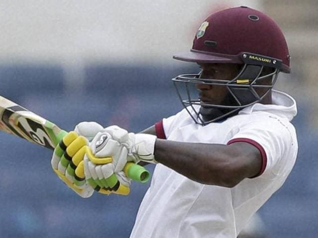 West Indies' Jermaine Blackwood plays a shot under the look of India's wicketkeeper Wriddhiman Saha. (AP Photo) West Indies' Jermaine Blackwood plays a shot under the look of India's wicketkeeper Wriddhiman Saha. (AP Photo)