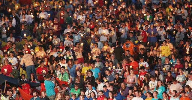 Pilgrims participating in the World Youth Day 2016 hold candles at an evening vigil with Pope Francis at the Campus Misericordiae in Brzegi, near Krakow, Poland on Saturday (AP) Pilgrims participating in the World Youth Day 2016 hold candles at an evening vigil with Pope Francis at the Campus Misericordiae in Brzegi, near Krakow, Poland on Saturday (AP)