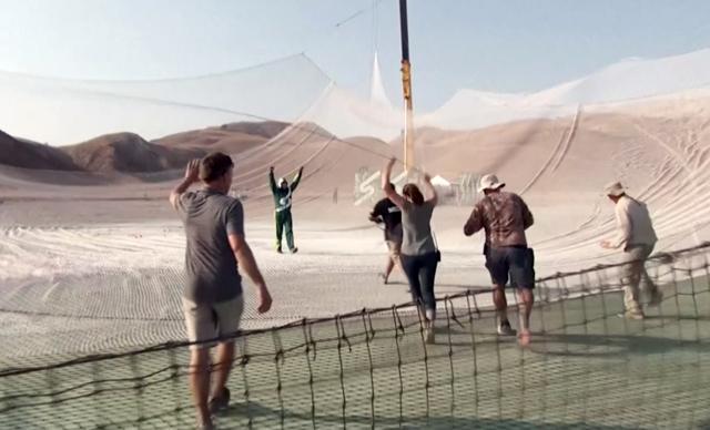 Aikins thus, made history, becoming the first person to leap without a parachute and land in a net instead. (AP) Aikins thus, made history, becoming the first person to leap without a parachute and land in a net instead. (AP)