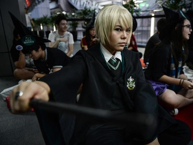 Another Harry Potter fan dressed as Draco Malfoy waits to receive a copy of the book in Thailand. (AFP) Another Harry Potter fan dressed as Draco Malfoy waits to receive a copy of the book in Thailand. (AFP)