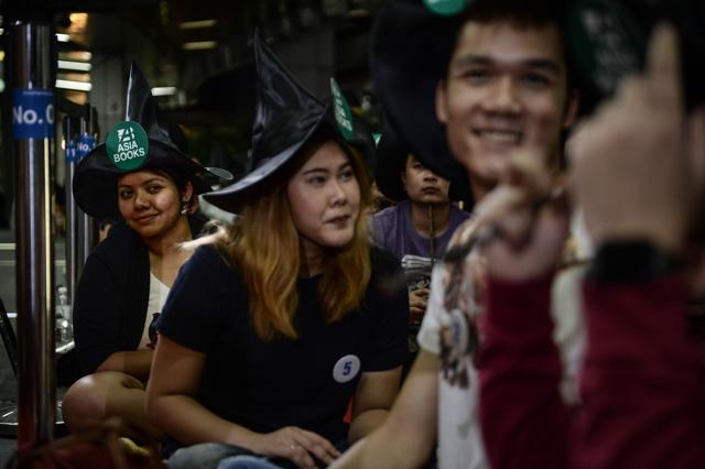 Fans wait to receive the copy of their Harry Potter book outside a bookstore in Bangkok on Sunday. (AFP) Fans wait to receive the copy of their Harry Potter book outside a bookstore in Bangkok on Sunday. (AFP)