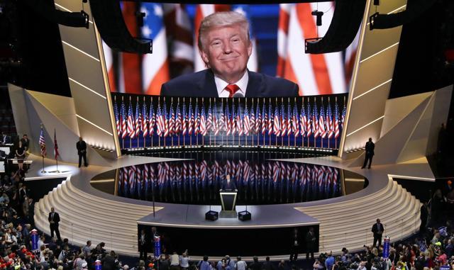 In this July 21, 2016 photo, Republican presidential candidate Donald Trump smiles as he addresses delegates during the final day session of the Republican National Convention in Cleveland. (AP) In this July 21, 2016 photo, Republican presidential candidate Donald Trump smiles as he addresses delegates during the final day session of the Republican National Convention in Cleveland. (AP)