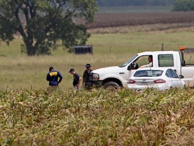 Investigators work the scene of Saturday's hot air balloon crash near Maxwell, Texas. (AP Photo) Investigators work the scene of Saturday's hot air balloon crash near Maxwell, Texas. (AP Photo)