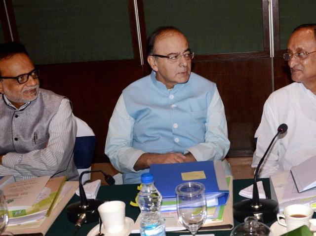 Union minister Arun Jaitley briefs the media with West Bengal finance minister Amit Mitra, and revenue secretary Hasmukh Adhia after a meeting of the Empowered Committee on GST, in Kolkata.(PTI File Photo)