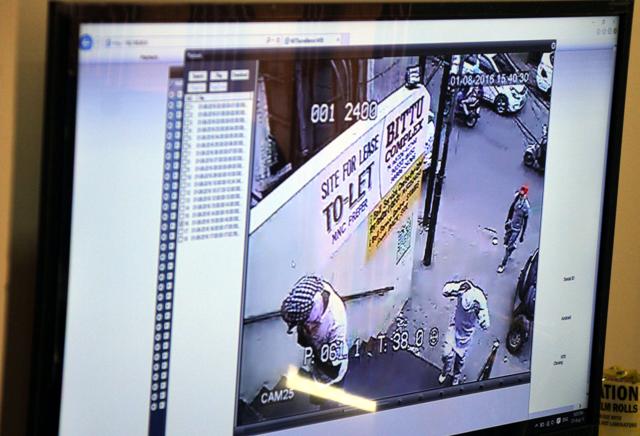 Caught in a security camera, the robbers entering the bank. (Video grab) Caught in a security camera, the robbers entering the bank. (Video grab)