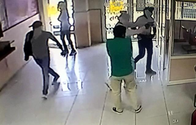 CCTV camera footage of the robbery at PNB in Ludhiana on Monday. (Video grab) CCTV camera footage of the robbery at PNB in Ludhiana on Monday. (Video grab)
