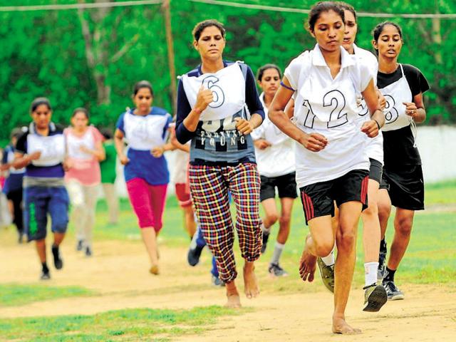 Girls participating in the 800-metre race during the police recruitment drive in Patiala. (Bharat Bhushan/HT Photo) Girls participating in the 800-metre race during the police recruitment drive in Patiala. (Bharat Bhushan/HT Photo)