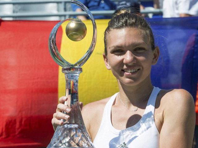 Simona Halep of Romania hits a return against Madison Keys of the United States. (AFP Photo) Simona Halep of Romania hits a return against Madison Keys of the United States. (AFP Photo)