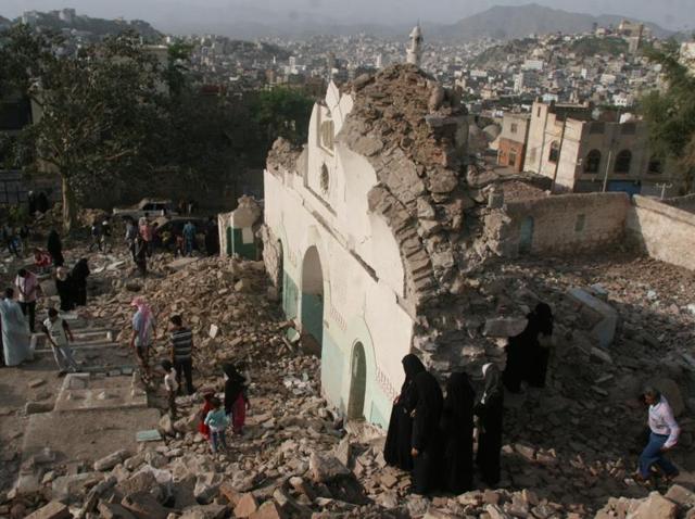 People gather among the rubble of a Sufi mosque that was blown up in an attack in Taez, Yemen on July 30, 2016. There were no casualties and no groups have claimed responsibility yet, according to local media.(Reuters Photo) People gather among the rubble of a Sufi mosque that was blown up in an attack in Taez, Yemen on July 30, 2016. There were no casualties and no groups have claimed responsibility yet, according to local media.(Reuters Photo)